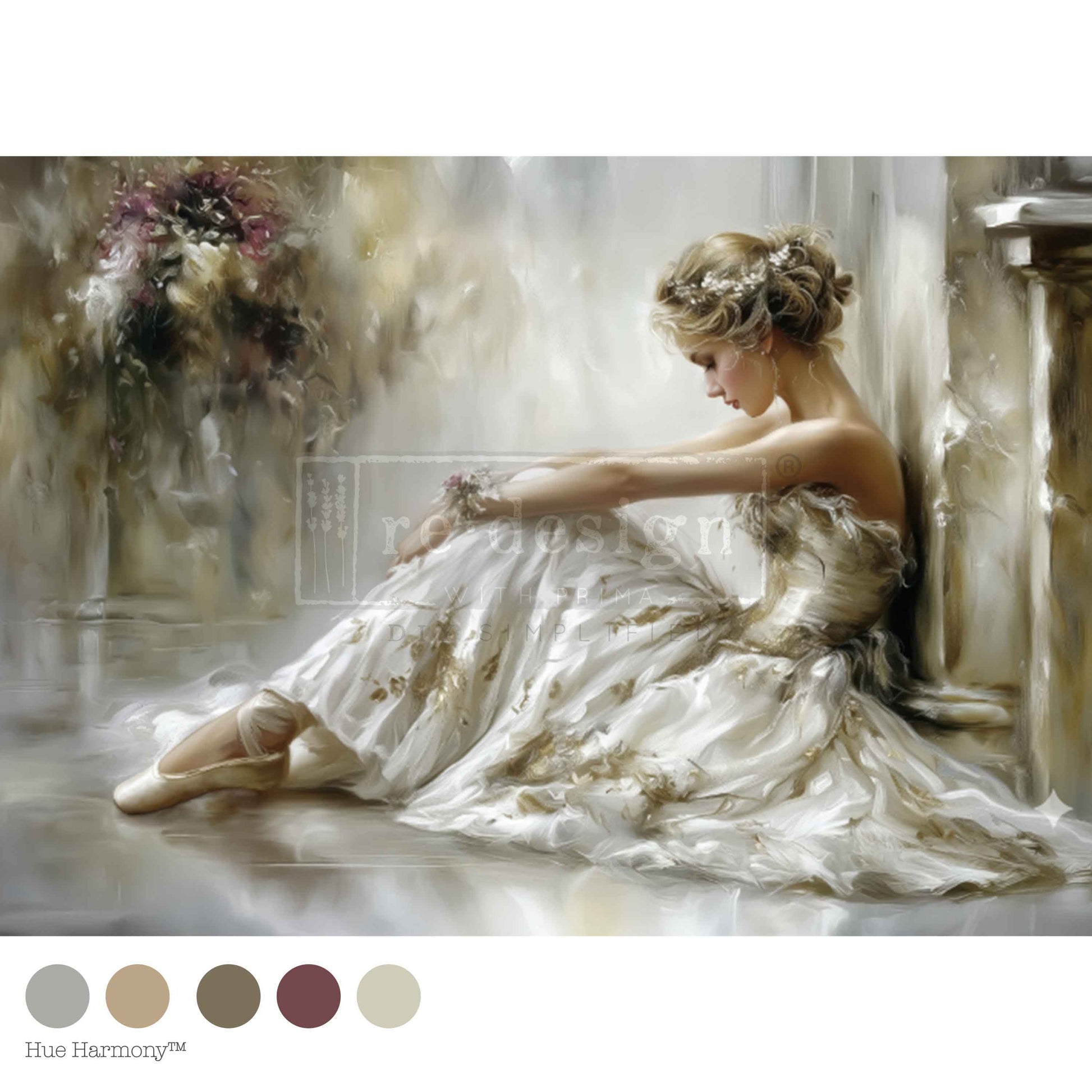 A woman in a strapless gown sits thoughtfully on the floor, leaning against a wall.