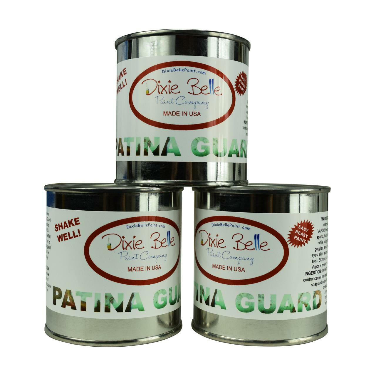 Three cans of Dixie Belle Patina Guard on a white background