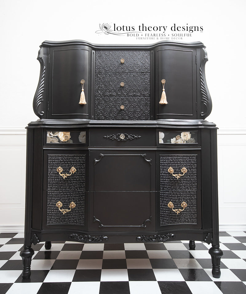 ornate cabinet covered in dark black Caviar Dixie Belle Chalk Paint