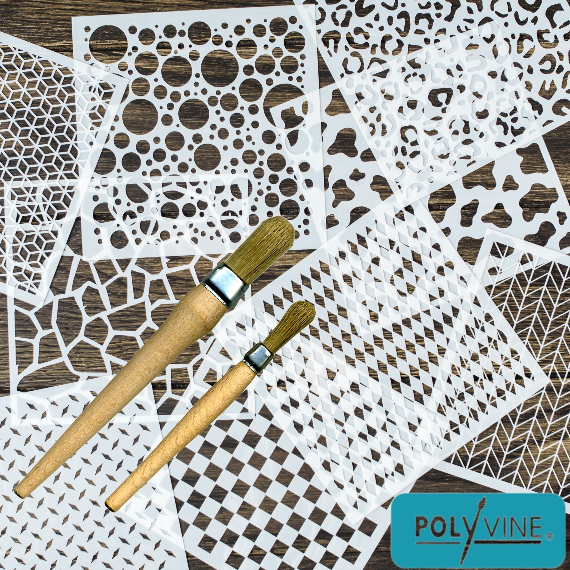 2 Polyvine Stencil brushes on background of white stencils. Tan wood handle with gold metal brace and tan bristles.