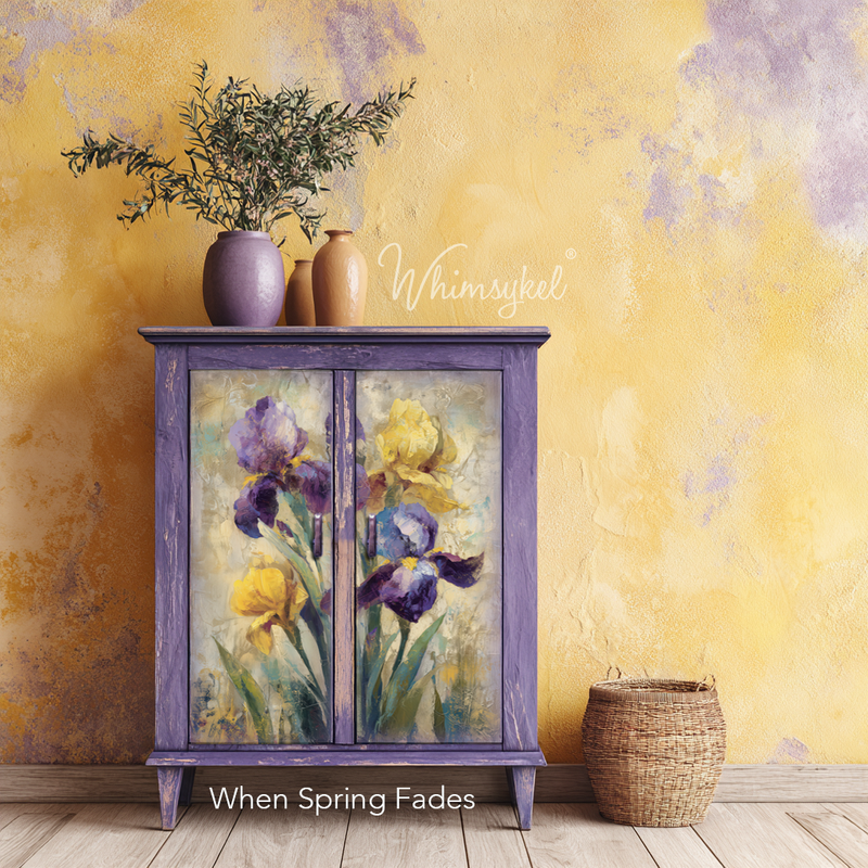 Decorative cabinet with floral design on a yellow wall, featuring the brand 'Whimsykel'.